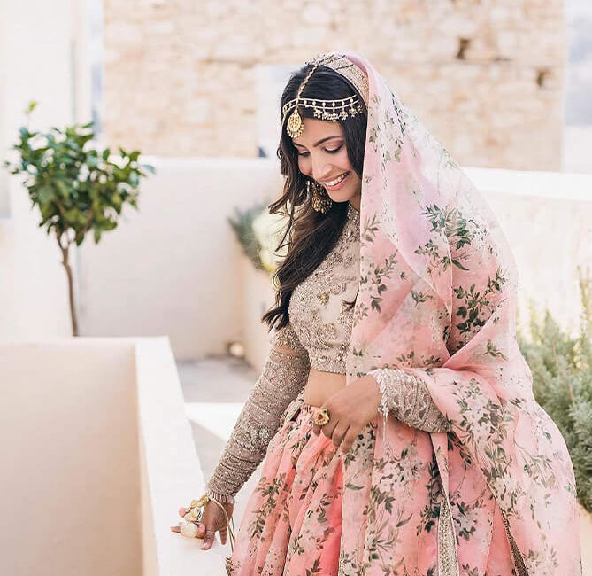 Indian bride with a pink wedding saree for her destination wedding in Rhodes Greece