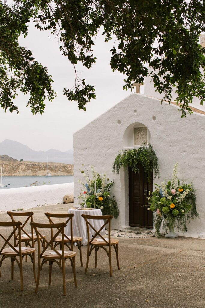 hiring a wedding planner in Greece guide by Eventions wedding planners - chapel decorated for a wedding in Greece